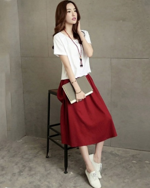 Set hồng áo vest croptop phối trắng kết hợp váy mini đắp tà - LaKing House